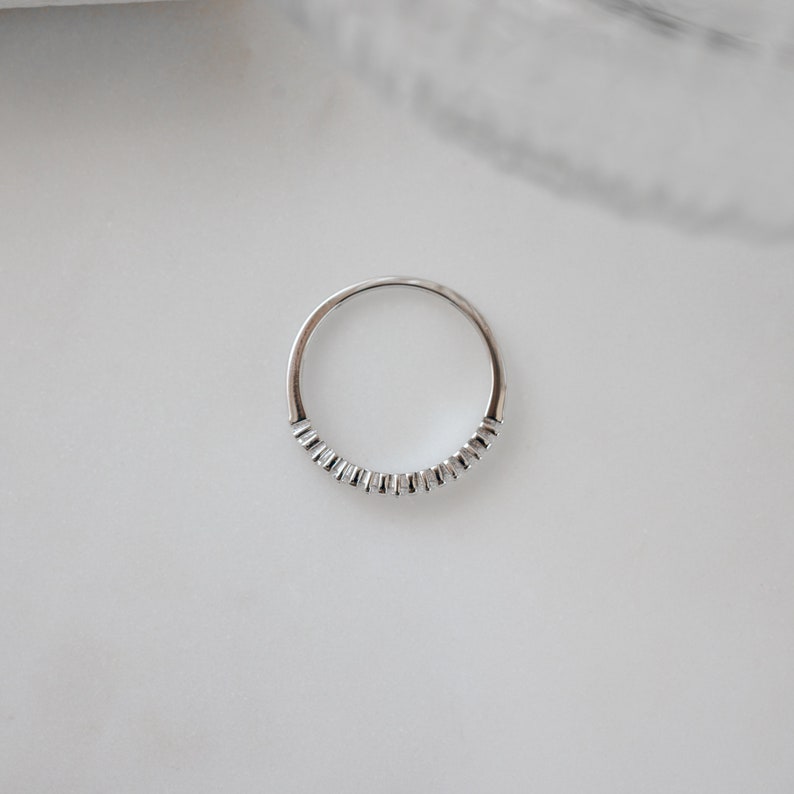 birds eye view of sterling silver fluted ring with diamonds