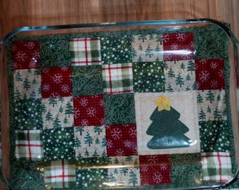 Quilted Christmas casserole trivet/ hot pad. Handmade country style hot pad with appliqued Christmas tree and star.