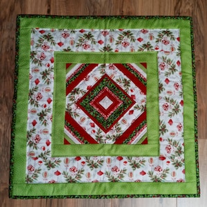 Quilted Christmas table topper. Handmade table topper for Christmas.
