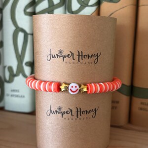 Red and Orange Smiley Clay Bead Bracelet