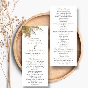 May include: Two white wedding ceremony program cards with gold palm leaf illustrations. The text includes the names Kaitlyn and Anthony, the date September 22, 20XX, a ceremony order, a list of key players, an in loving memory section, and a thank you note.