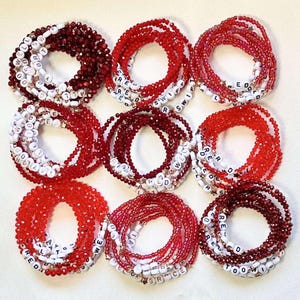 Friendship Bracelets Stack: Glass Beads & Star Spacers, Elastic, Charms | Customizable | Red Inspired