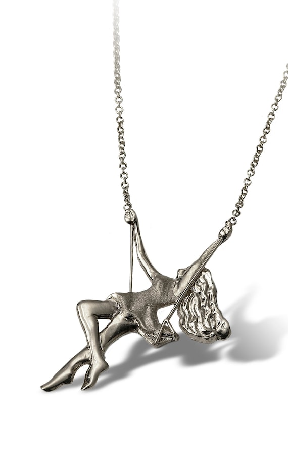 Girl on hotsell a swing necklace