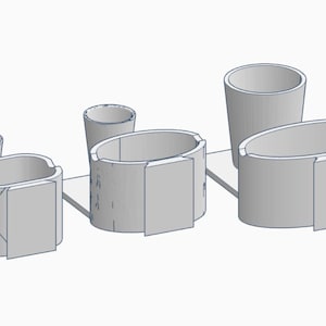 May include: A light grey 3D-rendered desk organiser with several compartments. It features cylindrical and oval-shaped holders of different sizes, all attached to a flat base. The design is minimalist and modern, suitable for office or home use.