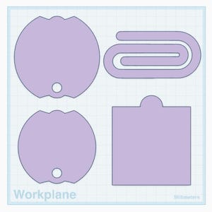 Può includere: Illustrazione digitale con quattro forme lilla su sfondo a griglia. Include due etichette circolari con intaglio e foro, una forma a graffetta e un quadrato con la parte superiore arrotondata. La parola "Workplane" è visibile.