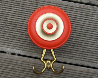 Brass and orange enamel wall coat rack - 1960s