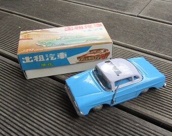Tin toy car from the 70s - Taxi MF 713 - friction mechanism - original box