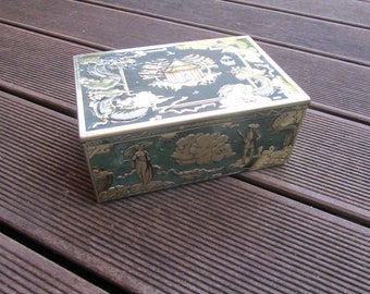 Old green and gold metal box with chinoiserie-style decorations