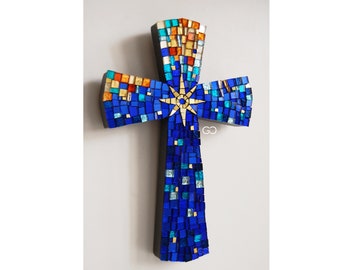 shaded blue wall cross, mosaic cross, colored glass cross in glass, cross with cross with 8-pointed golden star, cross with gift box