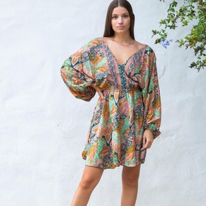 Multi-Print Boho Mini Dress: Deep V-Neck Babydoll Style