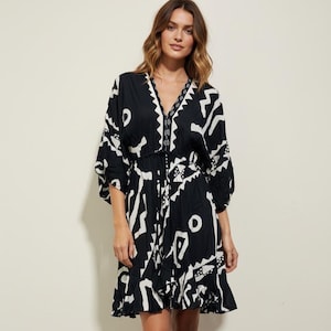 knee length boho summer dress Tassel Tie Floral Boho Dress