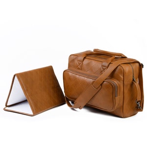 Große Wickeltasche aus echtem Lammfell.