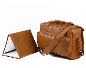 Bolso para pañales grande fabricado en auténtica piel de cordero.