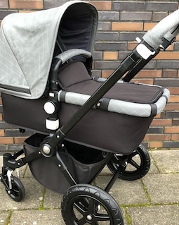 double stroller with steering wheel Bumbleride Indie Twin Color:Zug Island/Chartreuse launch_date:8/1/2018 Padded helmet cover shows With every grip