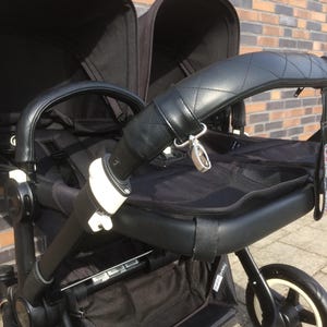 Bugaboo Donkey 1 Handlebar and safetybar covers 3 piece cover set Lamb Leather in the quilted and plain style.