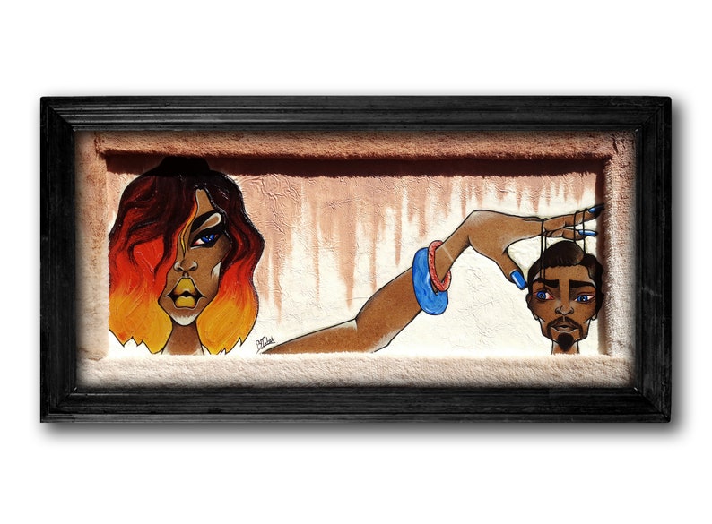 May include: A framed painting depicting a woman with red and orange hair holding a string attached to a man's head. The woman has blue eyes and is wearing a blue bracelet. The man has a beard and is looking at the viewer. The background is a light brown colour.