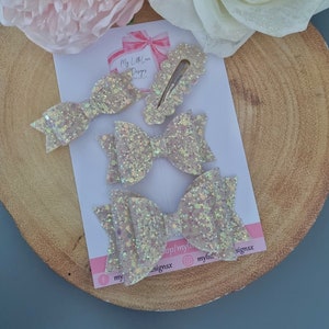 Frosted cream glitter hair bows **SOLD INDIVIDUALLY**