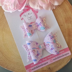 Lilac pink rainbow print unicorn print hairbow **SOLD INDIVIDUALLY**