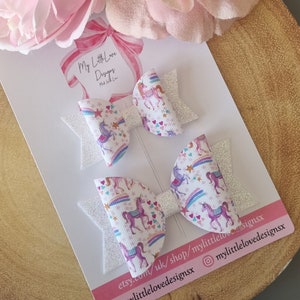 White rainbow print unicorn print hairbow **SOLD INDIVIDUALLY**