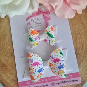 Bright rainbow dinosaur hair bow **SOLD INDIVIDUALLY**