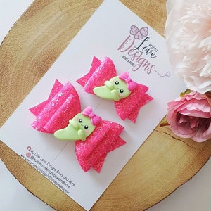 Glow in the dark bright pink hair bow