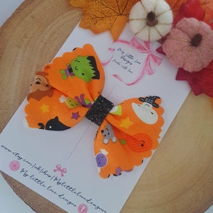 Glow in the dark halloween fabric print pinch bow