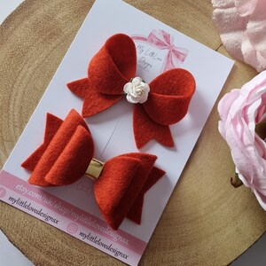 Rust felt hair bow **SOLD INDIVIDUALLY**