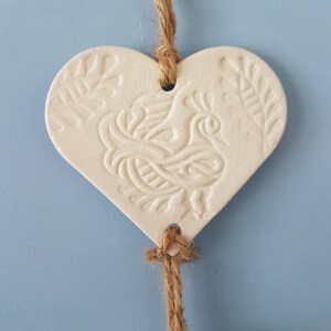 White clay hanging trio of hearts with peacock henna style design on natural twine. Wall hanging. Heart wall. Gift. Valentine's. Decoration. image 5