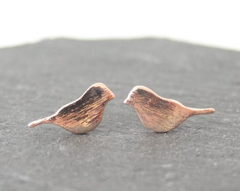 Pendientes golondrina oro rosa