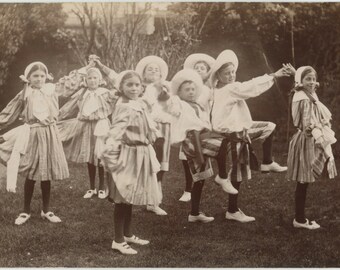 Antique postcard: real photograph, children's dance group in garden, social history RPPC c 1910s-20s, 138 x 88 mm