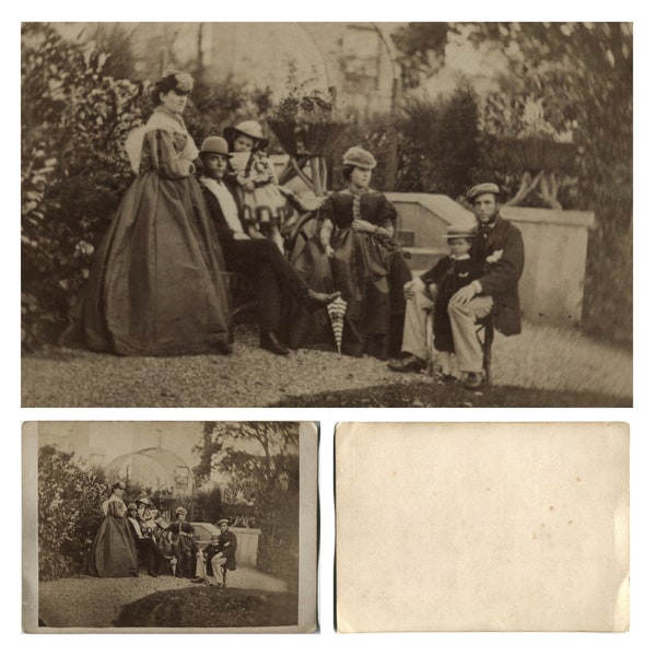 Antique Victorian photograph c 1860s, family group in the garden, women, men, children, boy, girl, crinolines, parasol, hats, social history