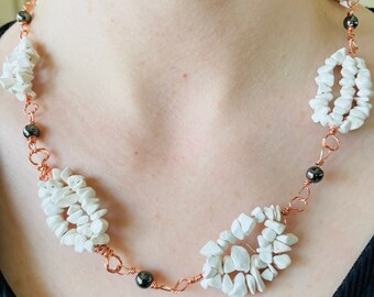 shell bead necklace with black and gold sahri thread Intertwined hematite