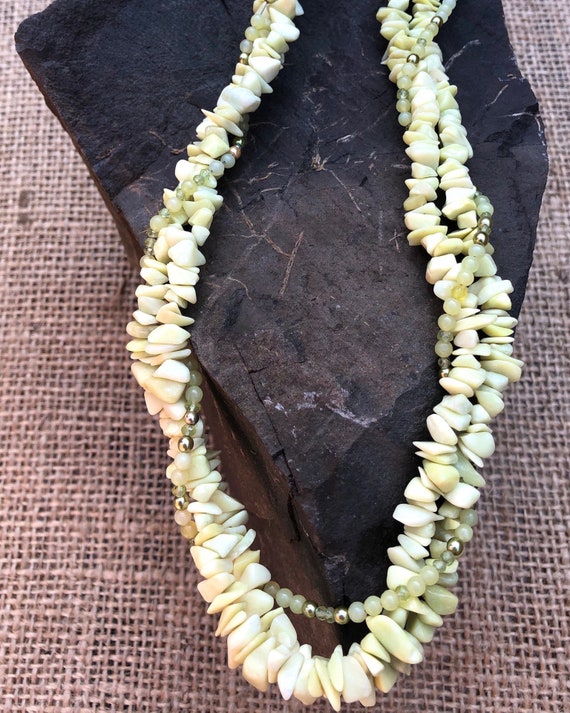 shell bead necklace with black and gold sahri thread Intertwined hematite