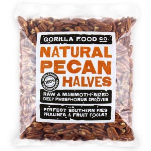 May include: A transparent bag filled with pecan halves. The label reads "GORILLA FOOD CO." and "NATURAL PECAN HALVES." The label also states "RAW & MAMMOTH-SIZED DEEP PHOSPHORUS GROOVES" and "PERFECT SOUTHERN PIES PRALINES & FRUIT FOOLS!!"