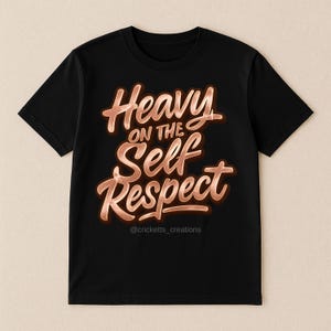 Puede incluir: Camiseta negra con la frase "Heavy on the Self Respect" en color cobre, en fuente cursiva con efecto 3D. La cuenta de redes sociales @cricketts_creations est&aacute; en la parte inferior.
