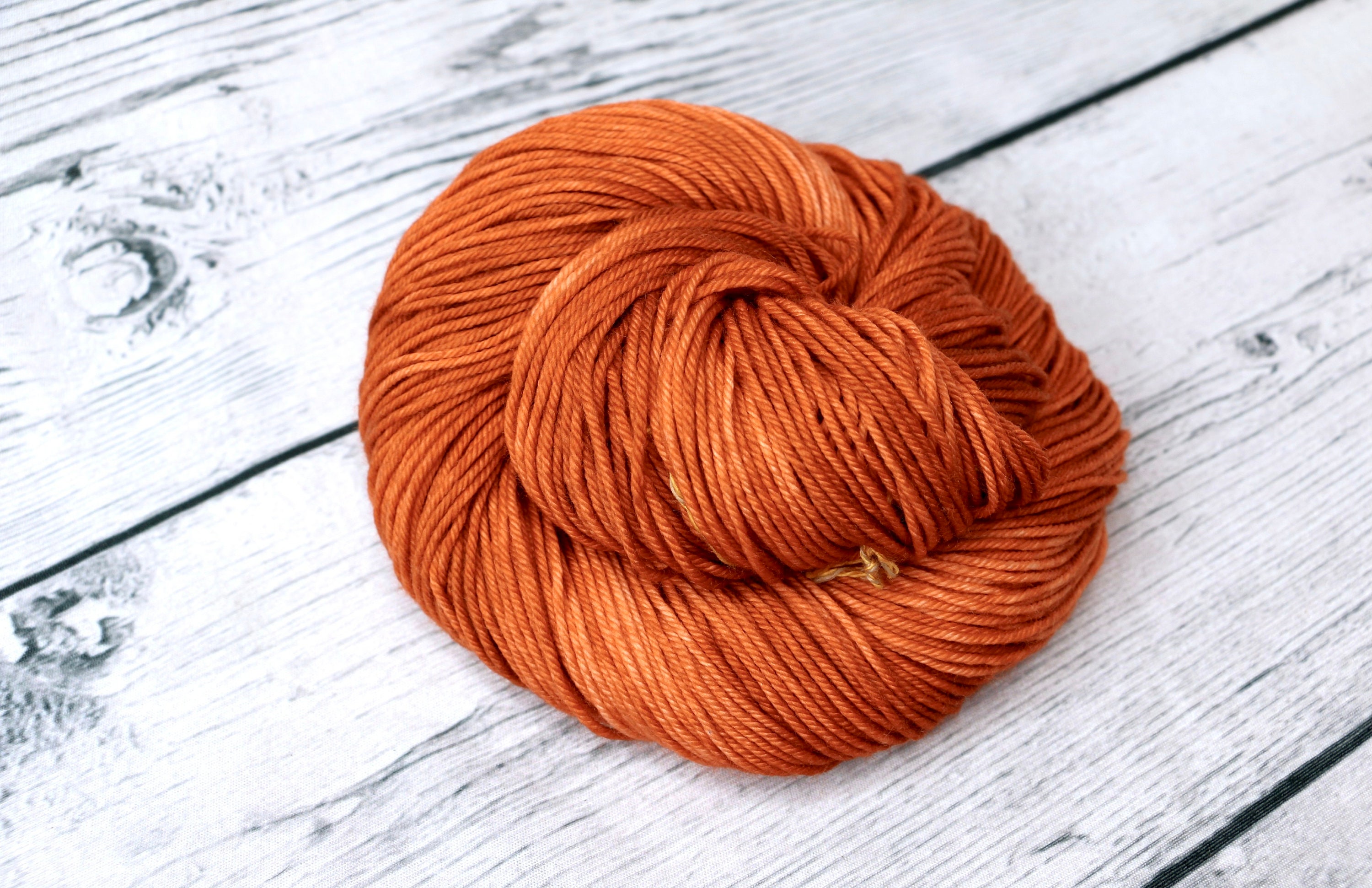 Burnt Orange (PRE-ORDER), a light orange tonal with pink and brown  undertones, hand dyed yarn, worsted, indie dyer