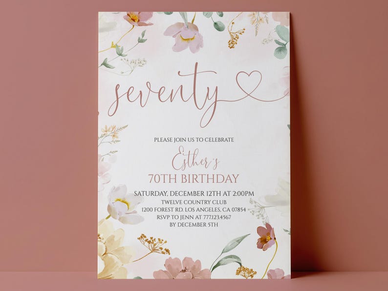 May include: A rectangular birthday invitation card featuring a white background with watercolor floral illustrations in shades of pink, yellow, and green. The text reads: seventy, Esther's 70th Birthday, Saturday, December 12th at 2:00PM, Twelve Country Club, 1200 Forest Rd. Los Angeles, CA 07854, RSVP to Jenn at 777.123.4567 by December 5th.