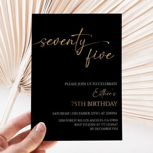 May include: Black invitation card with gold script text reading "seventy five". The card also includes the text "Please join us to celebrate Esther's 75th Birthday" with event details.