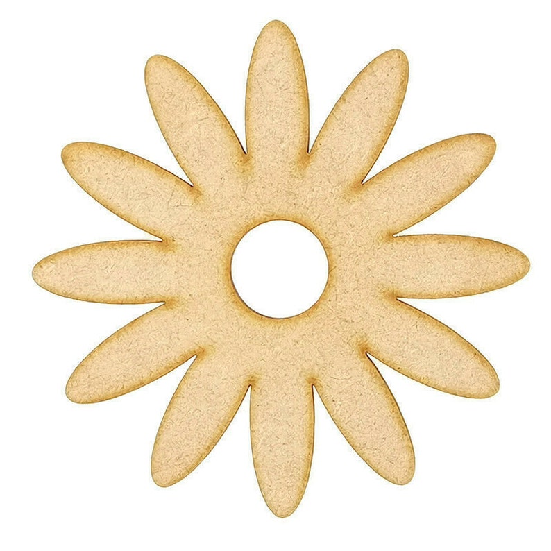 May include: A wooden cutout of a daisy flower with 12 petals and a hole in the center. The flower is light brown in color.