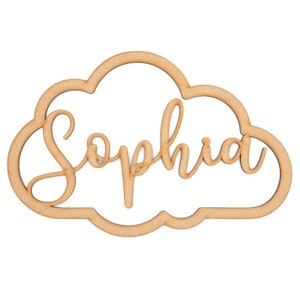 May include: Wooden cutout of a cloud with the name "Sophia" written in a cursive font.