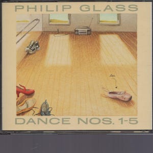 May include: CD case for Philip Glass's "Dance Nos. 1-5" album. The cover art features a room with sunlight streaming through windows, a boombox, and various pairs of shoes, including ballet slippers and high-heeled shoes.