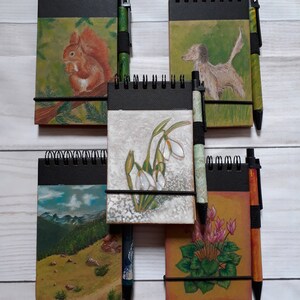 Taccuini disegnati a mano a tema autunnale, forestale, montagna