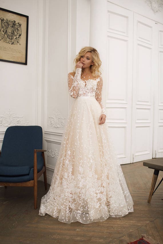 a line wedding gown with sleeves