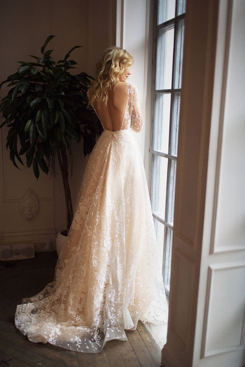 Muse wedding with long sleeves , low back , A line wedding dress