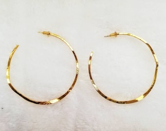 Large gold-plated hoop earrings
