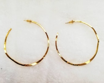 Large hoop earrings gilded with fine gold