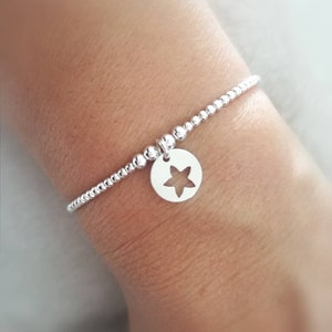 Women's bracelet in 925 silver with openwork medal and star charm