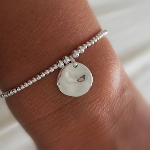 Women's bracelet in 925 silver with large wavy medal