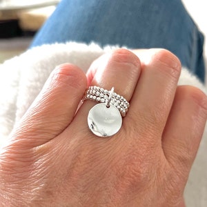 3-reihiger Ring aus 925er Silber mit gewellter Medaille