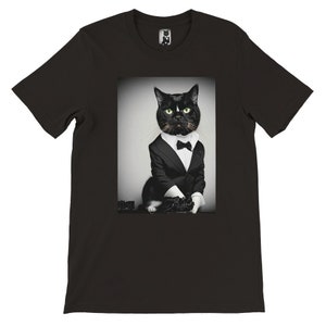 May include: A black cat wearing a tuxedo and bow tie. The cat is sitting on a black surface and has a serious expression on its face.